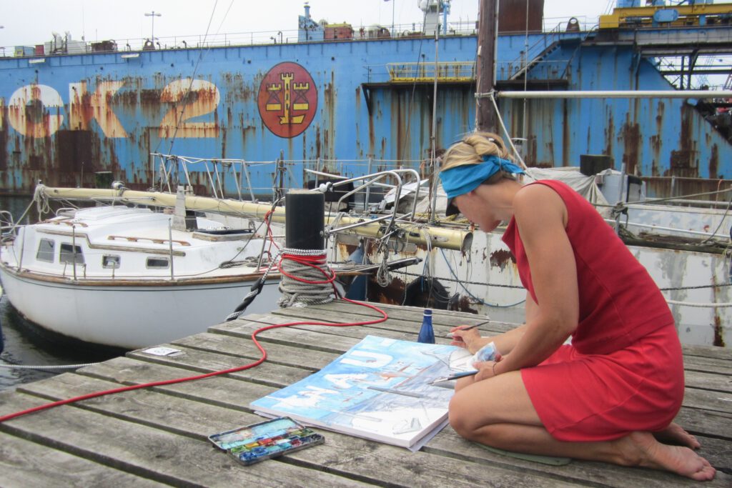 Kerstin Mempel beim Malen im Hafen von Kiel